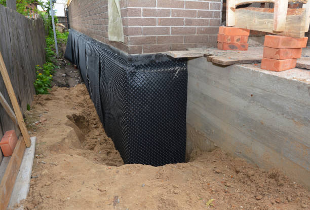 SJ Waterproofing Pros technician performing targeted Exterior Waterproofing assessment in Stockton, KS